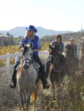 Woman riding horse